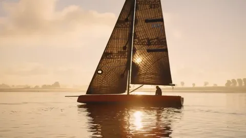Woy 26 sailing at sunset